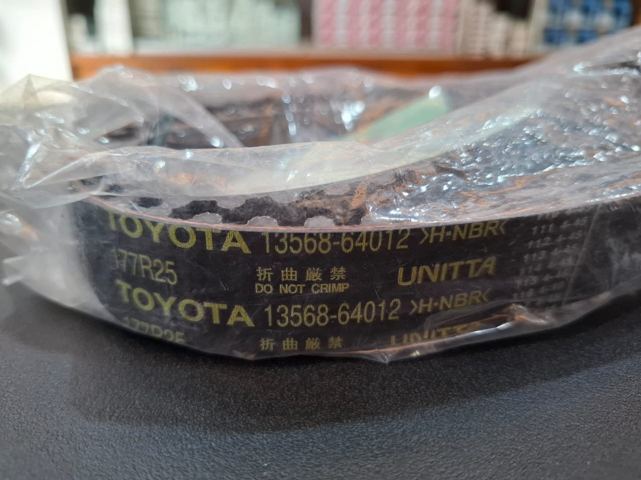 13568 69066 1 Toyota Genuine 13568-69066 timing belt package Made in Japan with UNITTA belt marked 13568-64012 and 177R25